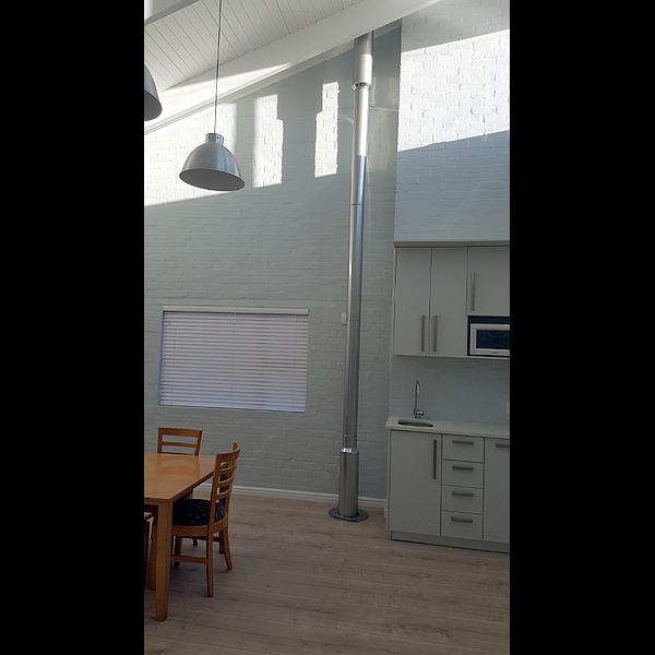Double storey chimney through floor